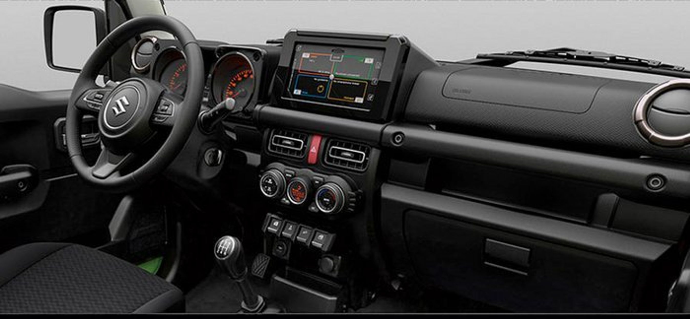 Førerpladsen i Jimny.