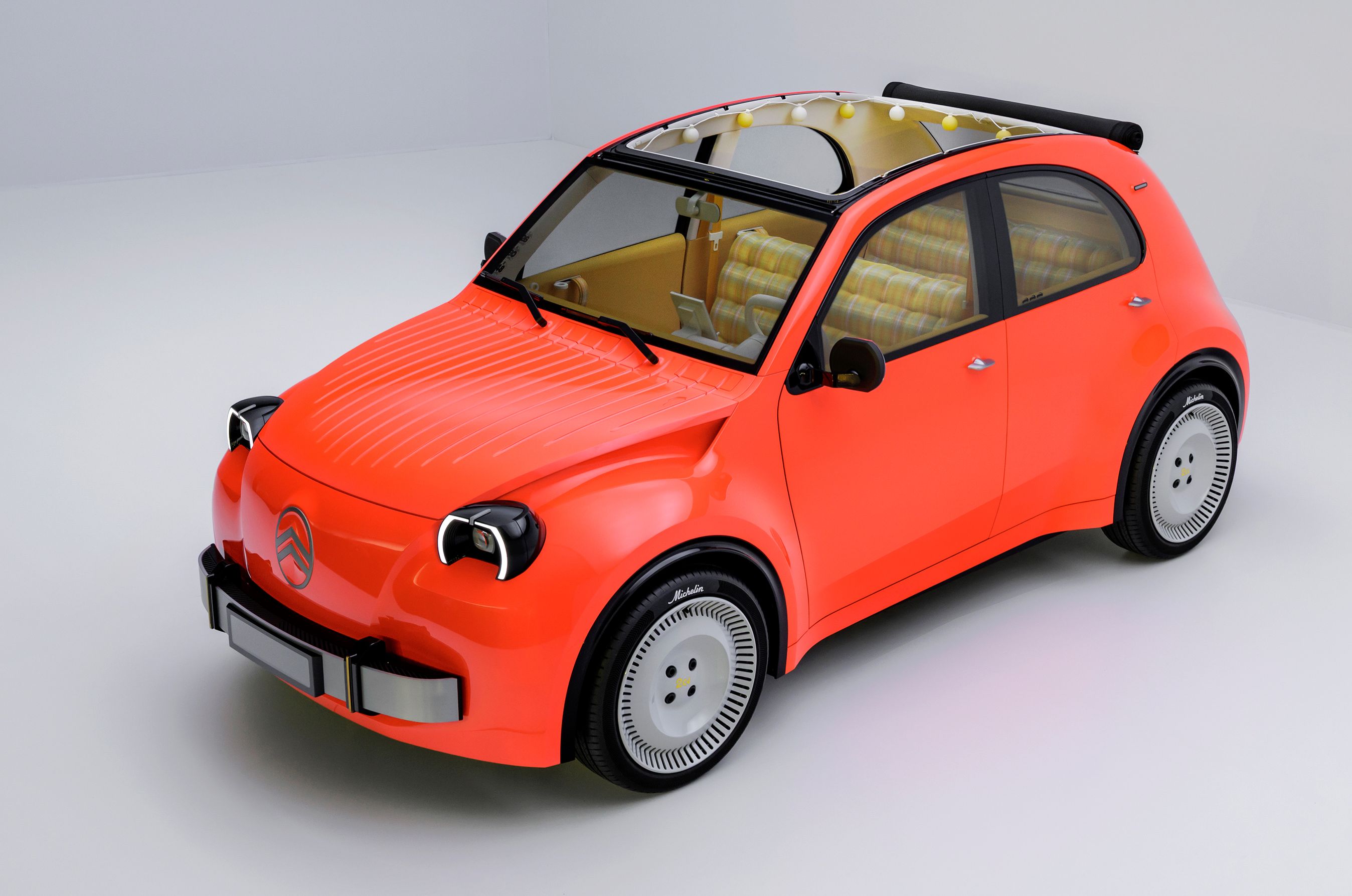 Rød Citroën 2CV set skråt oppefra.