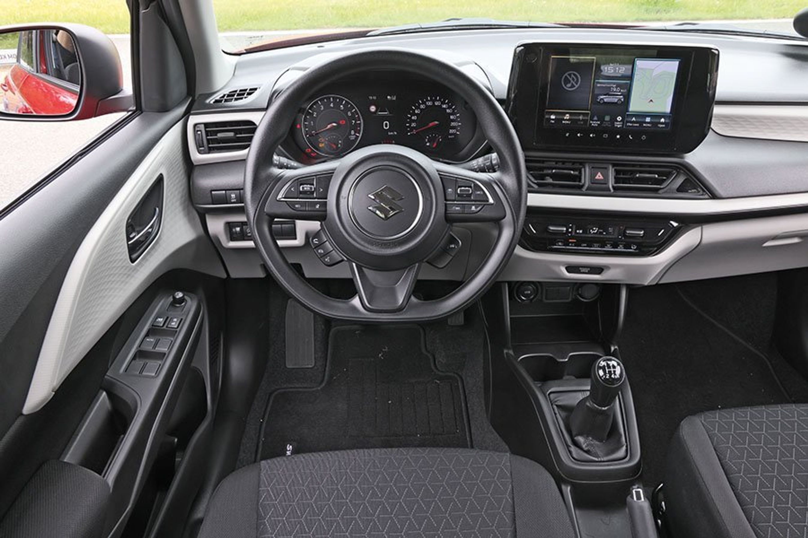 Førerplads i en Suzuki Swift