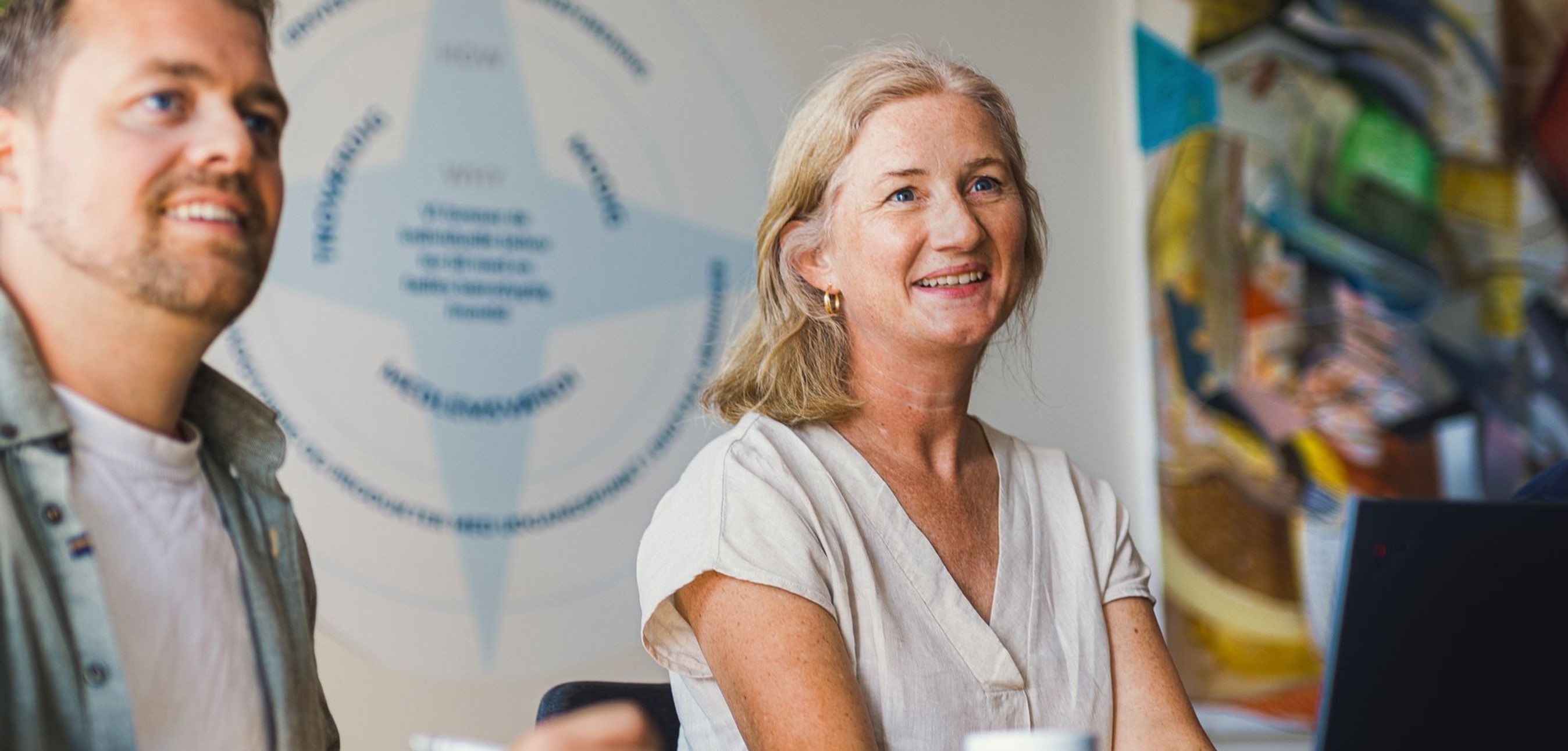 Tre FDM medarbejdere i mødelokale