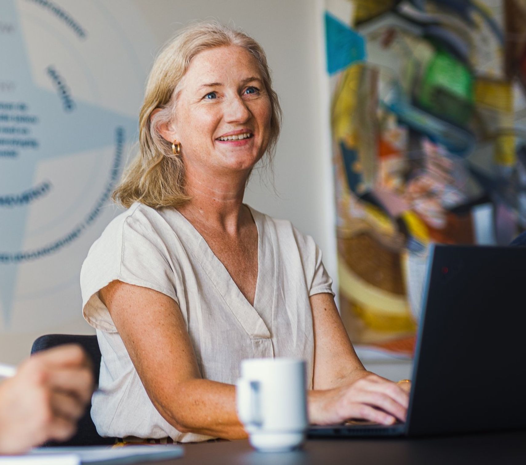 Tre FDM medarbejdere i mødelokale