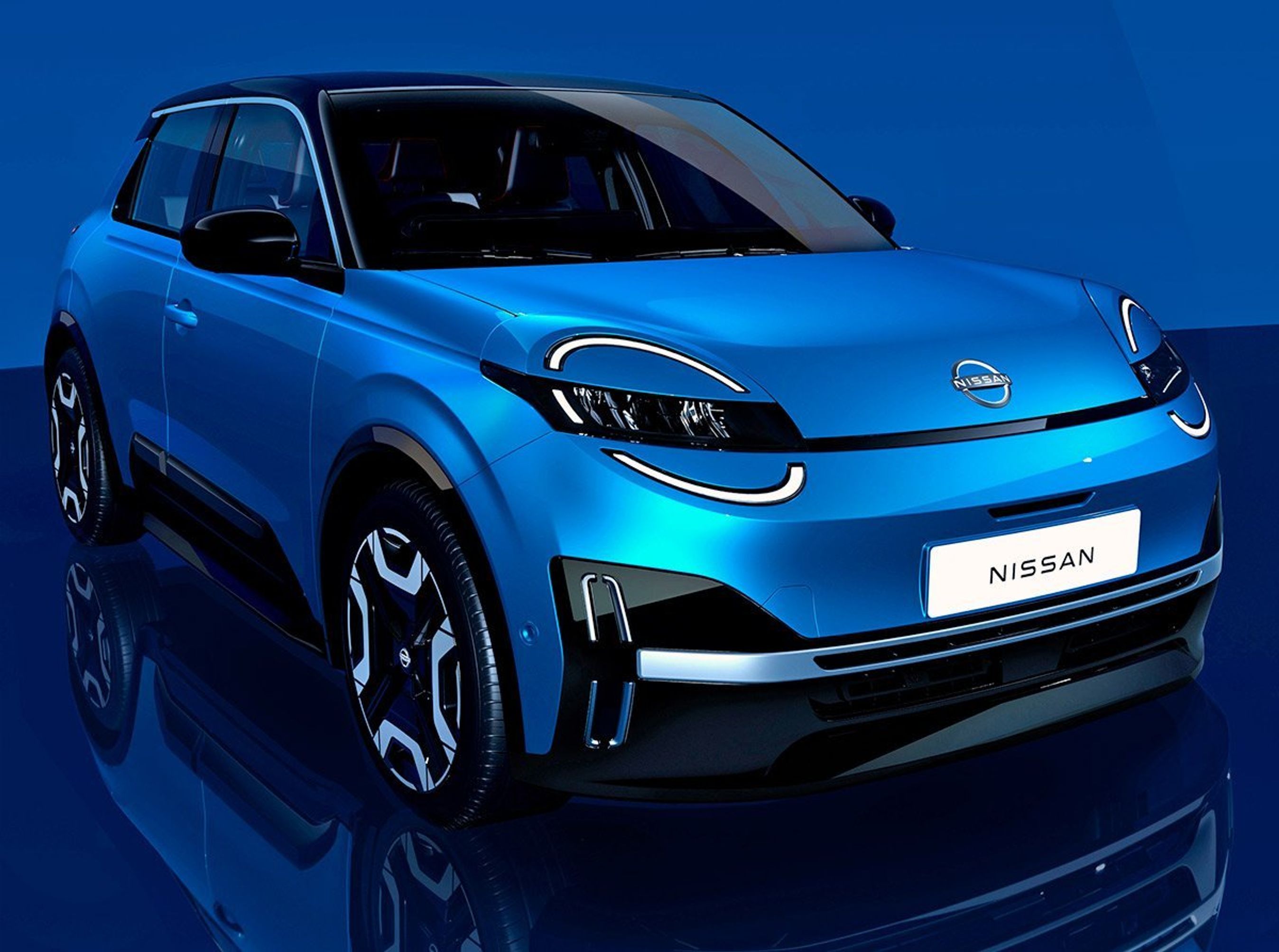 Blå Nissan Micra forfra.