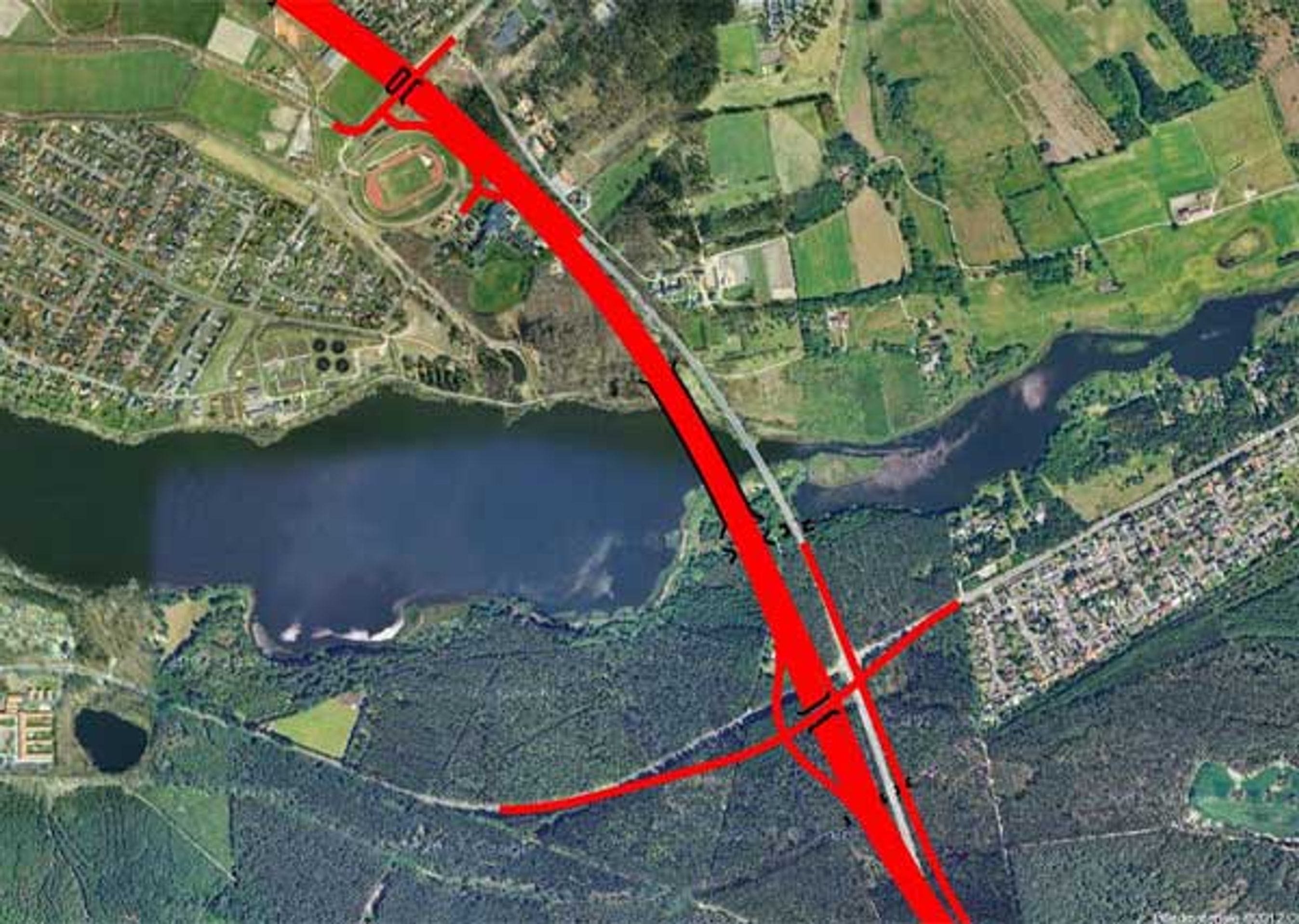 Første spadestik belv taget, hvor motorvejen skal føres over Gudenåen på en lavbro. Den nye bro går lige ved siden af den gamle hovedvejsbro, der bliver bevaret selv om den lukker meget mere for udsynet i ådalen end den nye, længere motorvejsbro.