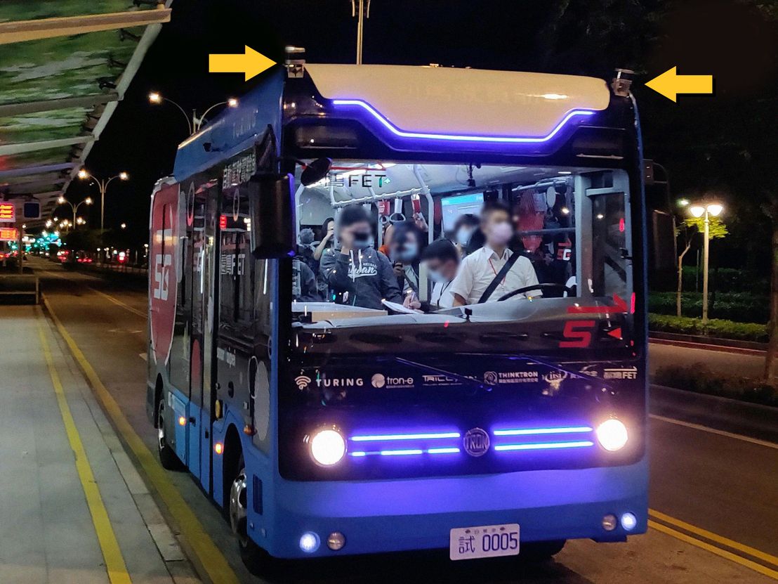 Figure 3. The bus has two lidar sensors (indicated by the yellow arrows) in front, in addition to several cameras