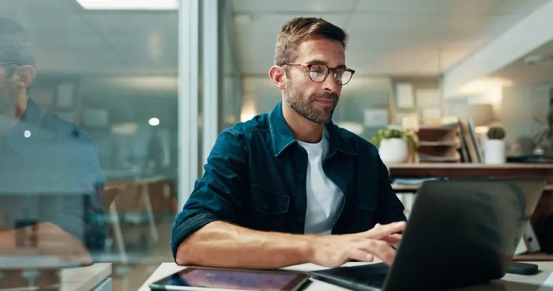 man working on laptop