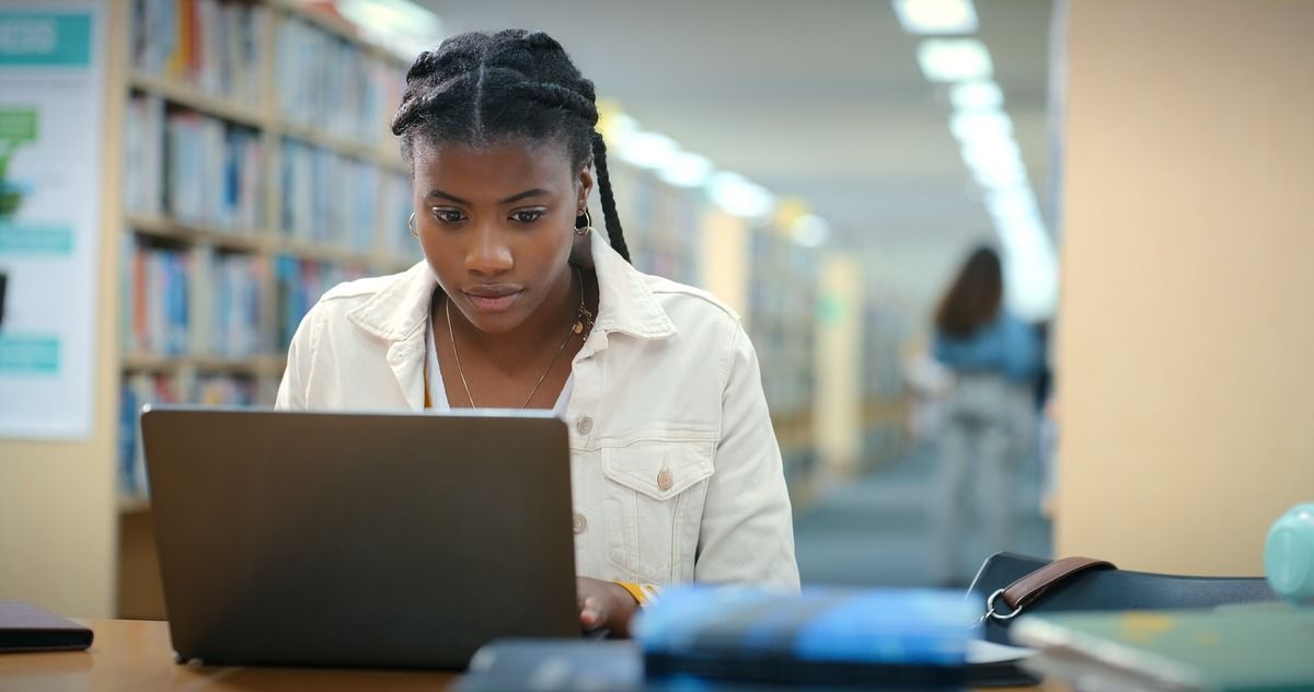 Woman looking at her laptop