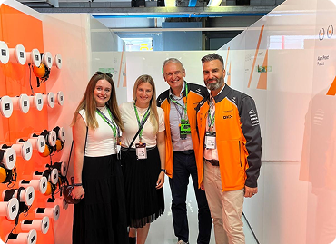 McLaren paddock group photo charger wall