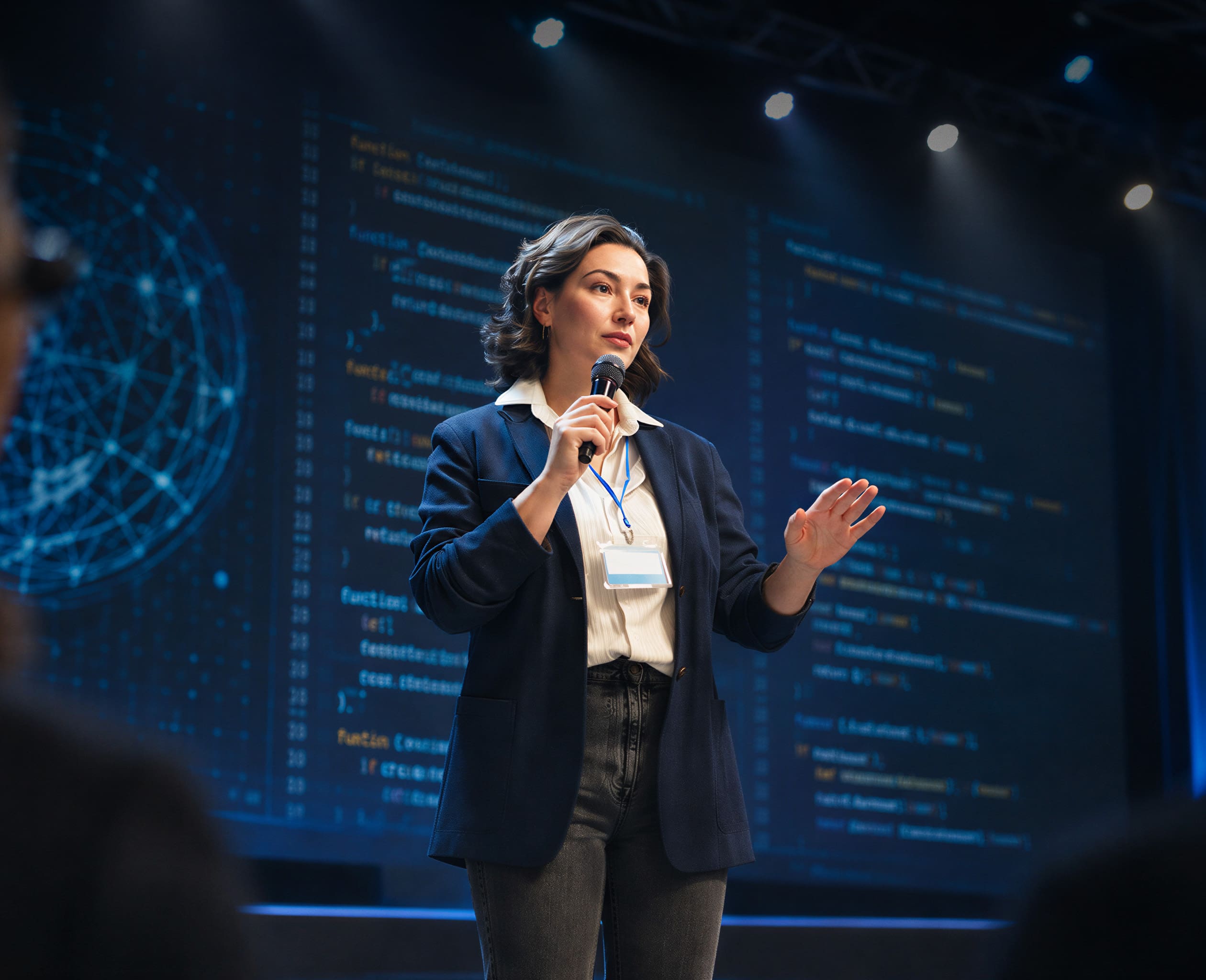 Woman speaking in front of people