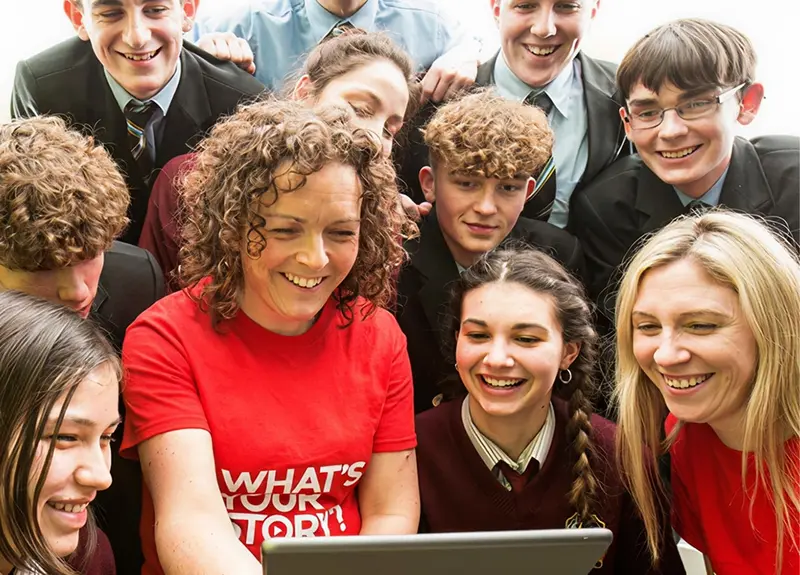volunteers children looking at tablet