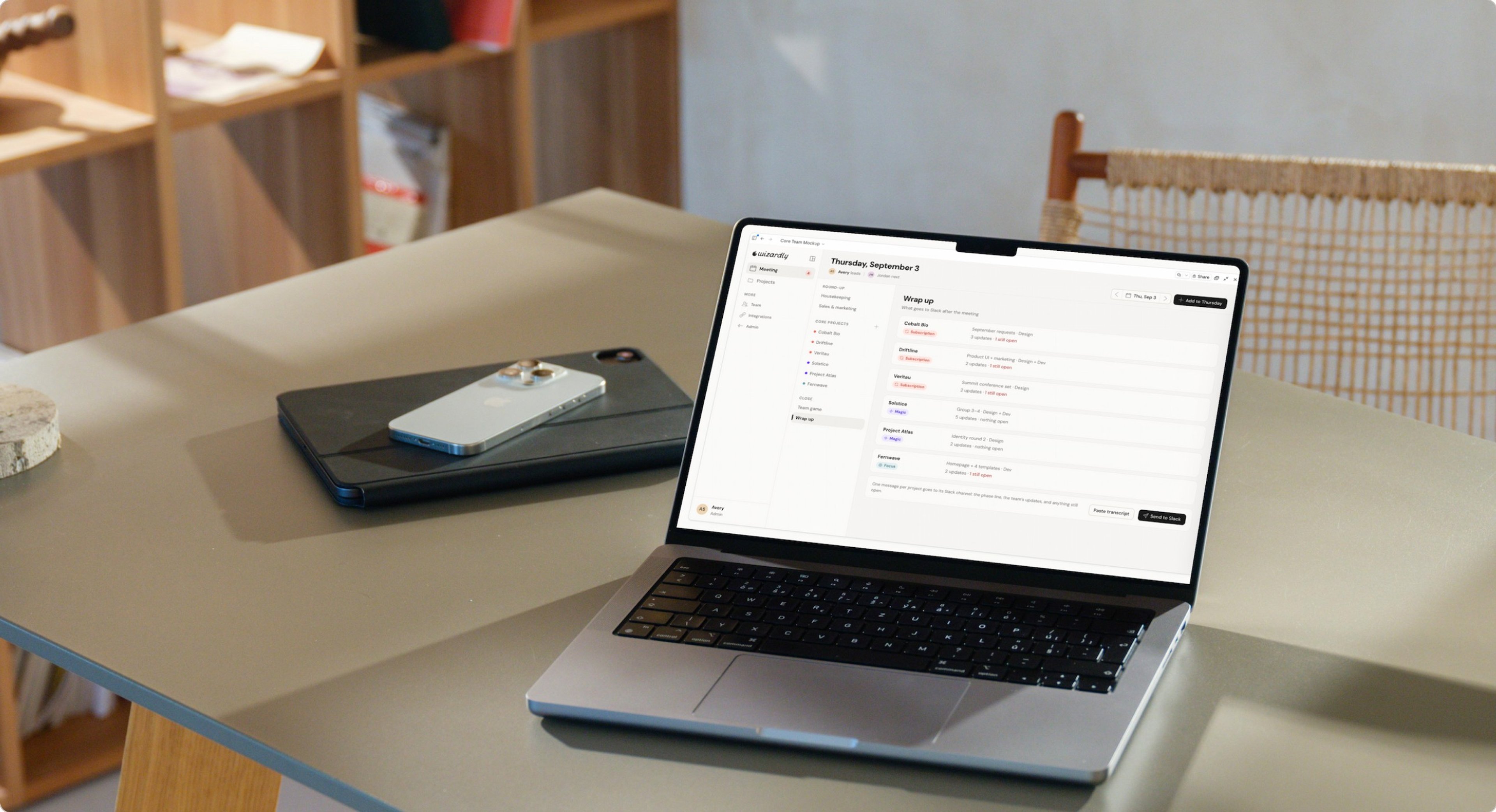 The Wizardly Core Team app open on a laptop on an office desk