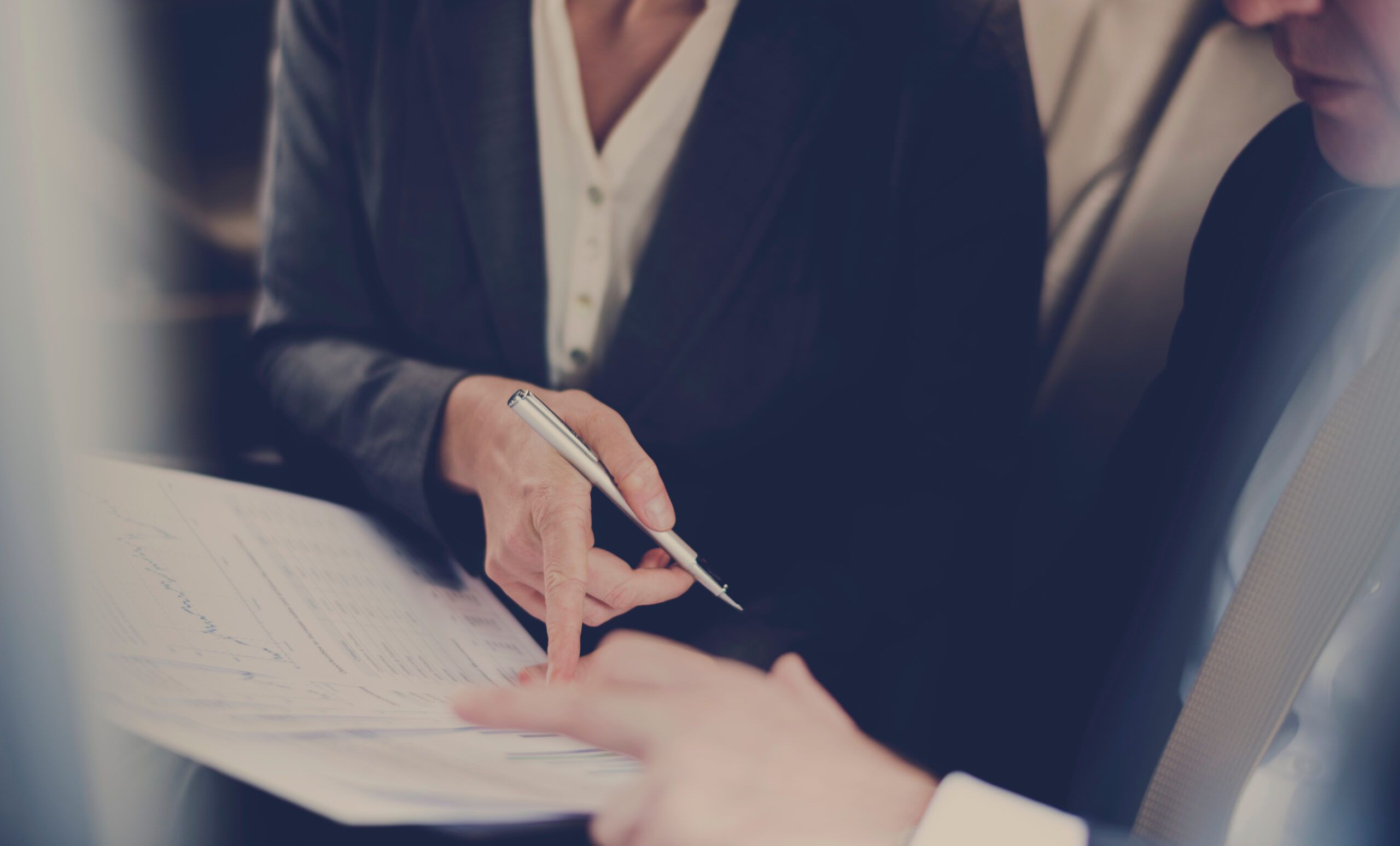 two people reviewing a contract 