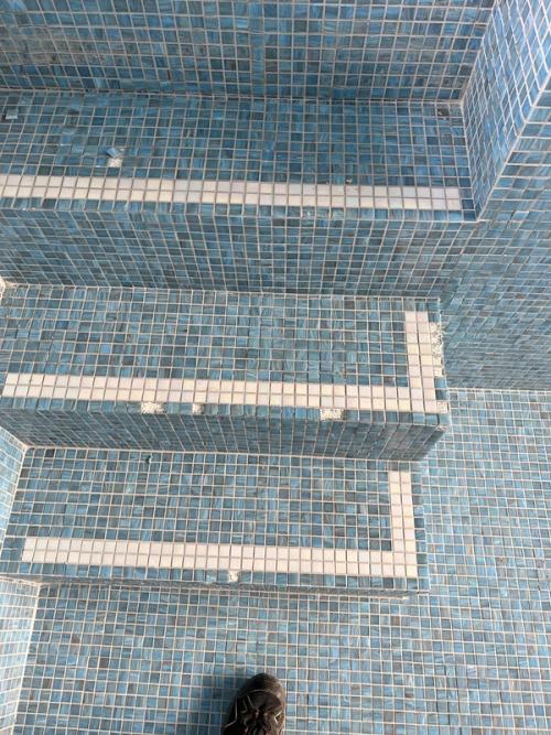 Missing tiles and broken grout