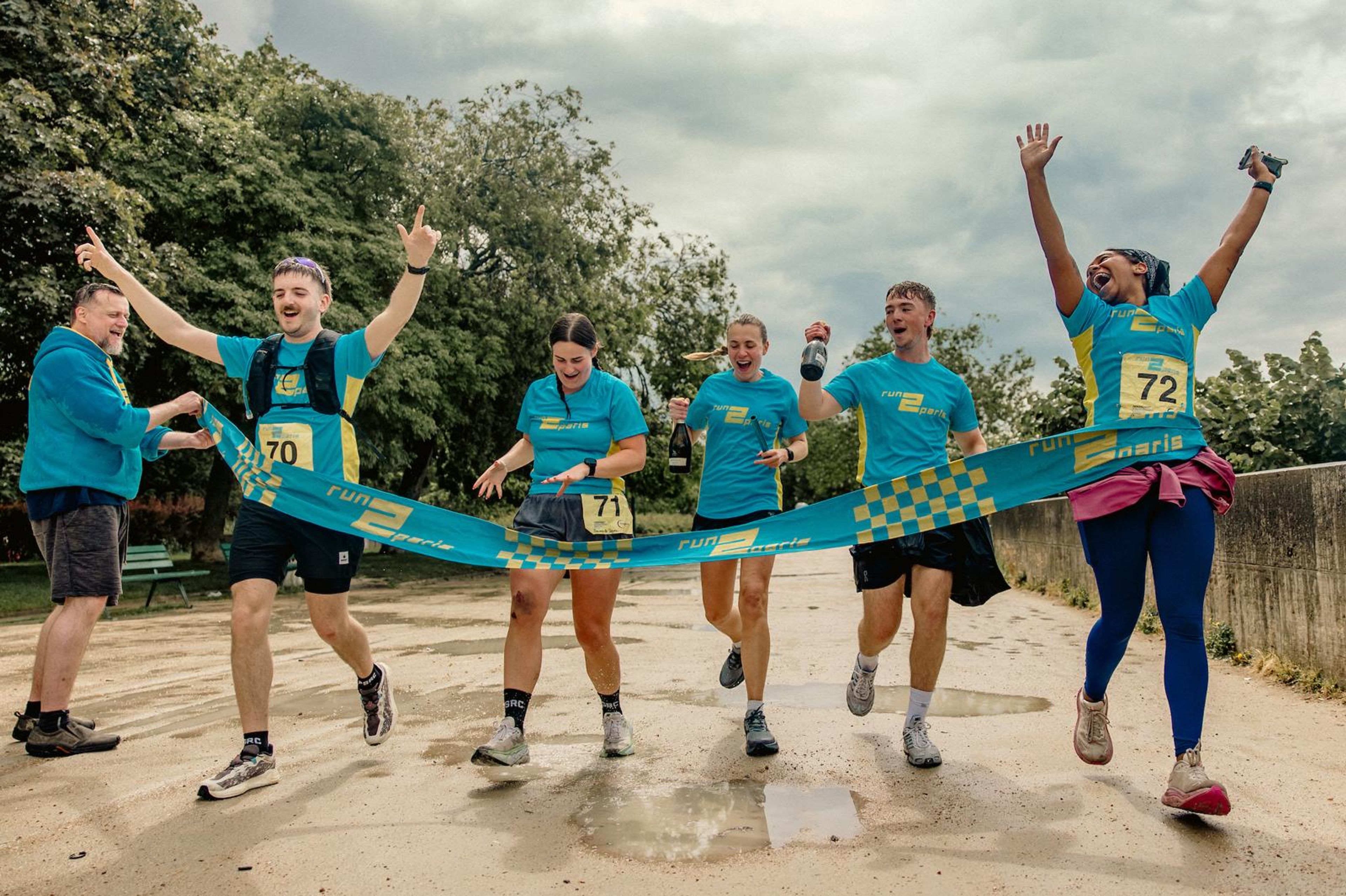 Team In Digital cross the 'Run 2 Paris' finish line.