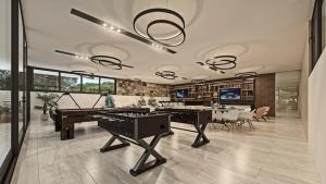 Amada Residencial - Salón de juegos