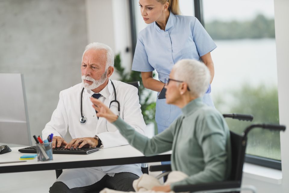 A doctor and patient in conversation.