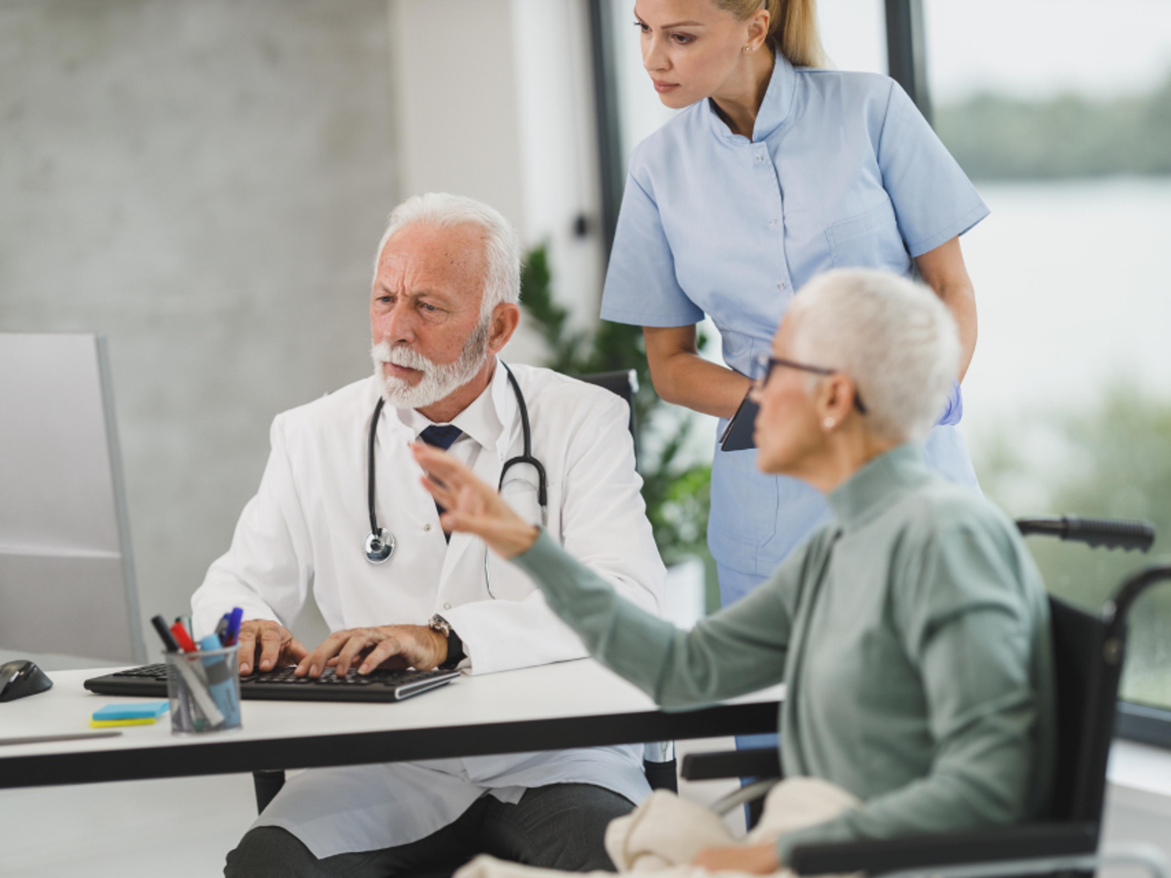 A doctor and patient in conversation.