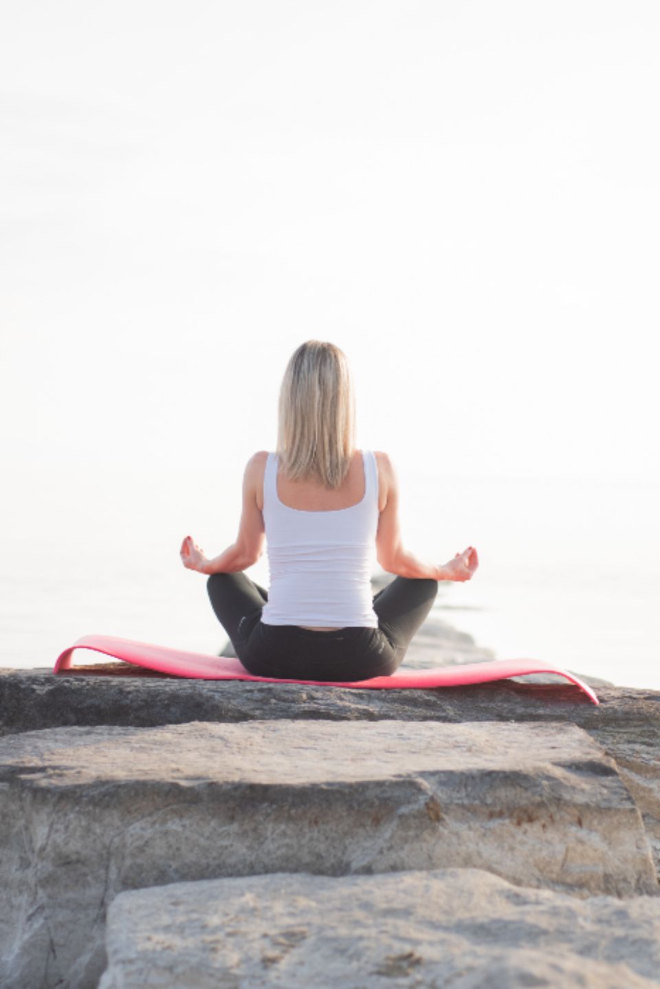 A person practicing mindfulness in soft light.