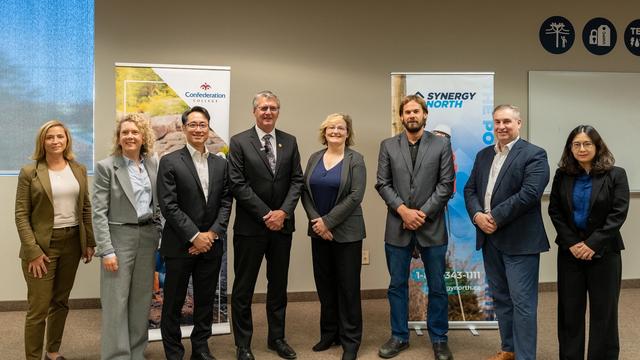 College and industry partners stand together at Confederation College announcing $3.2M funding for clean energy upgrades.