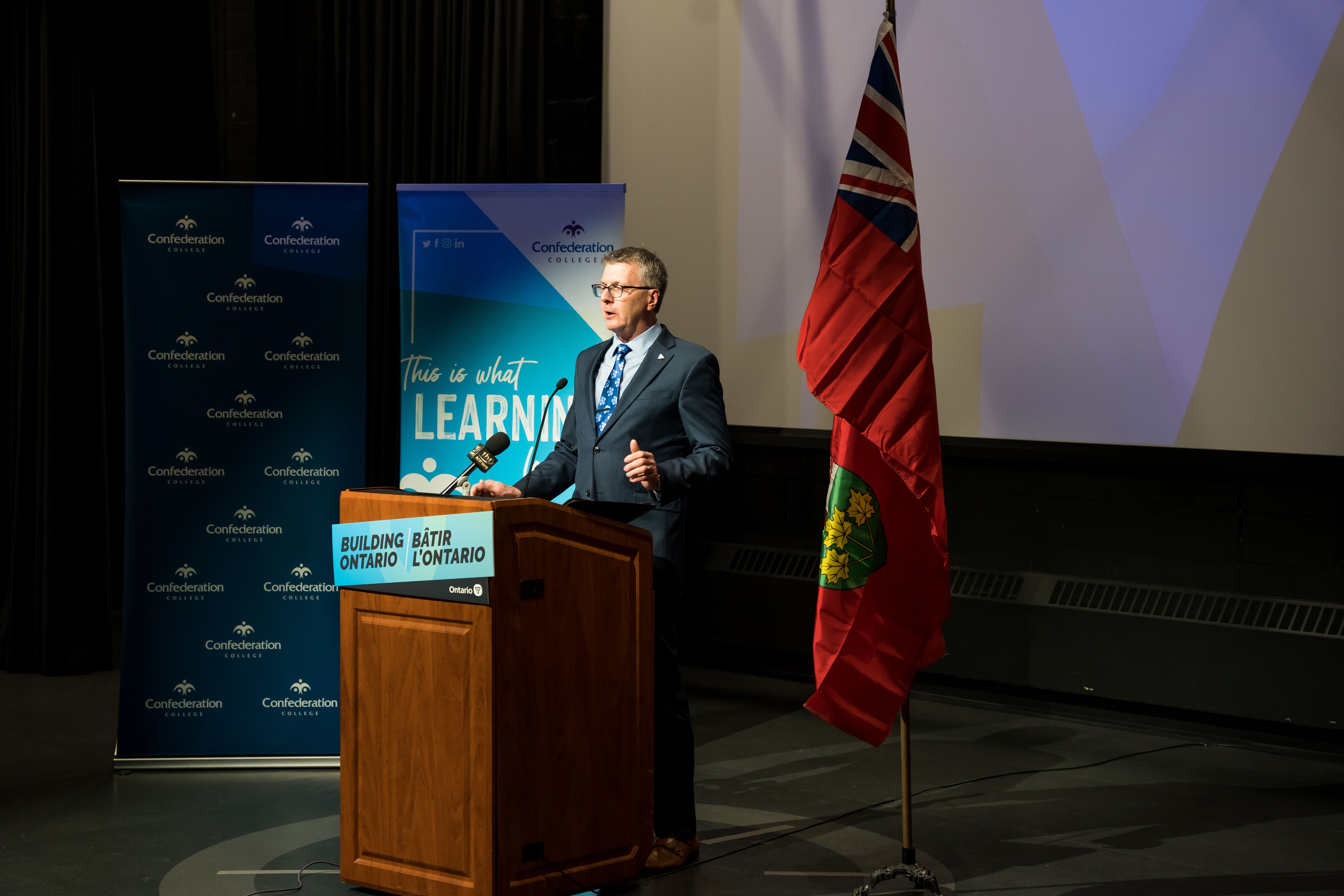 MPP Kevin Holland speaks at Confederation College during the Dibaajimogamig lecture theatre revitalization announcement