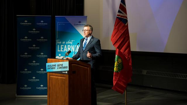 MPP Kevin Holland speaks at Confederation College during the Dibaajimogamig lecture theatre revitalization announcement
