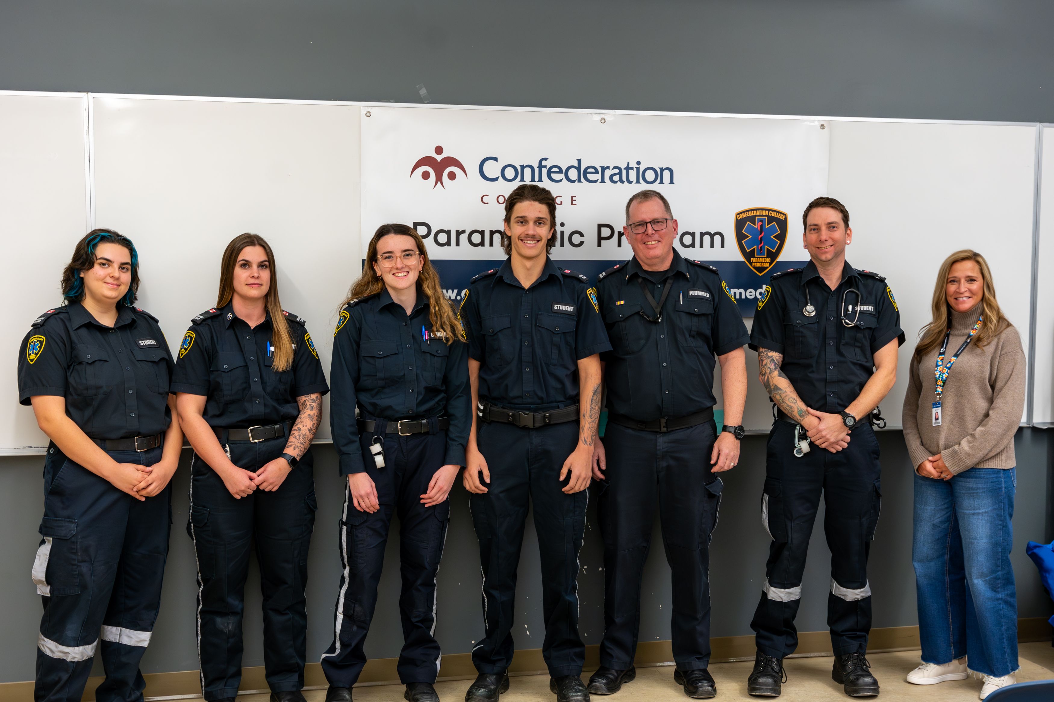 Confederation College Students with Program Coordinator and College President