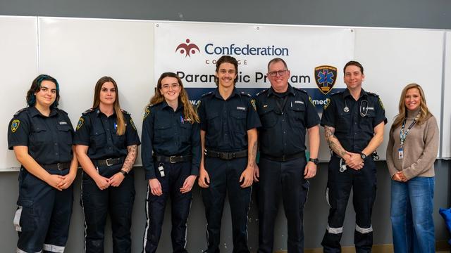Confederation College Students with Program Coordinator and College President