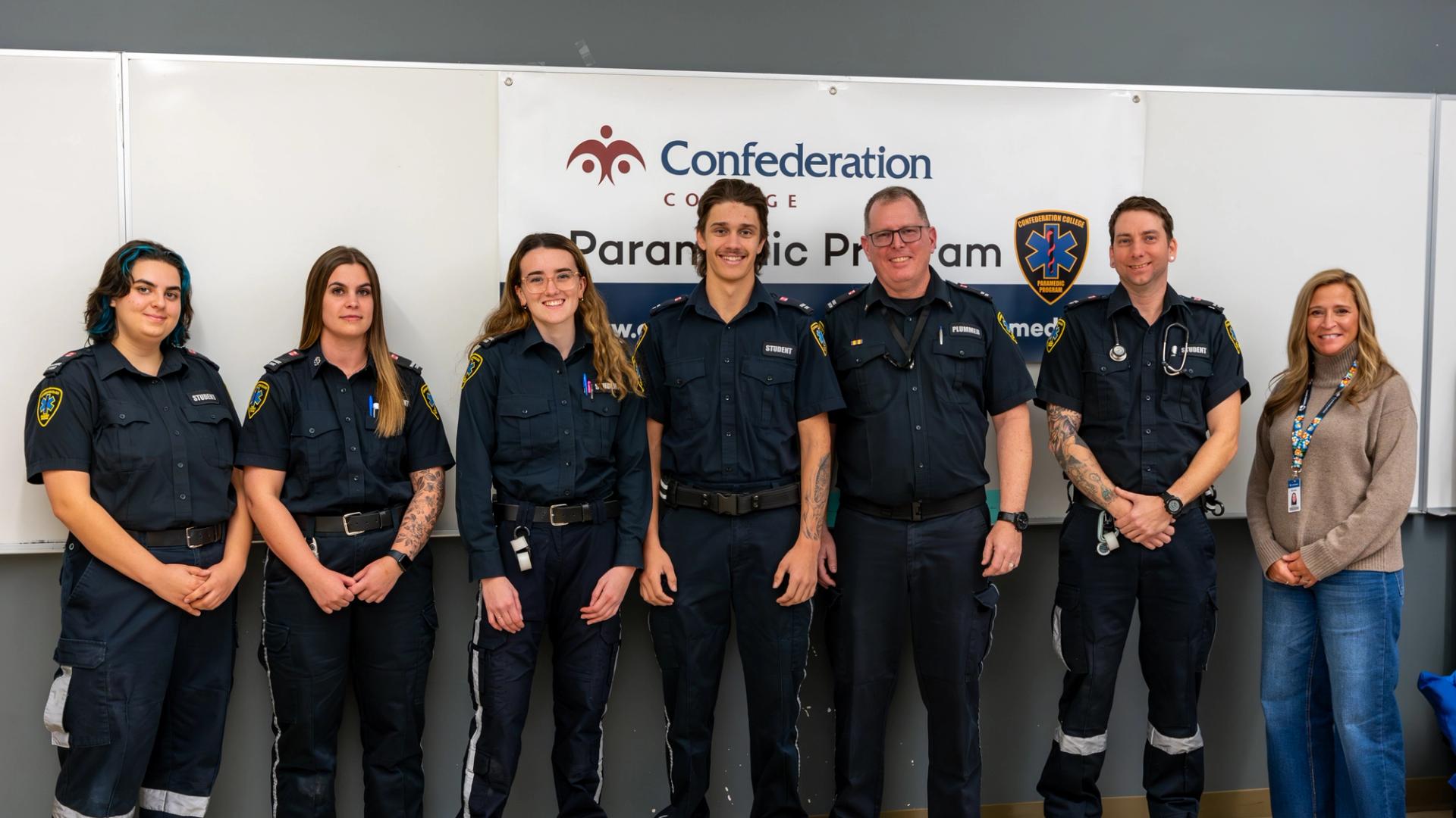 Confederation College Students with Program Coordinator and College President