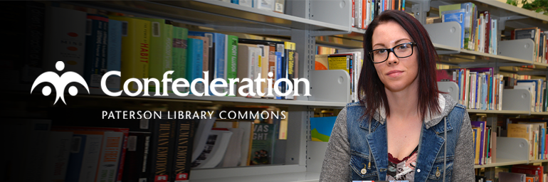 A girl standing in the perterson library