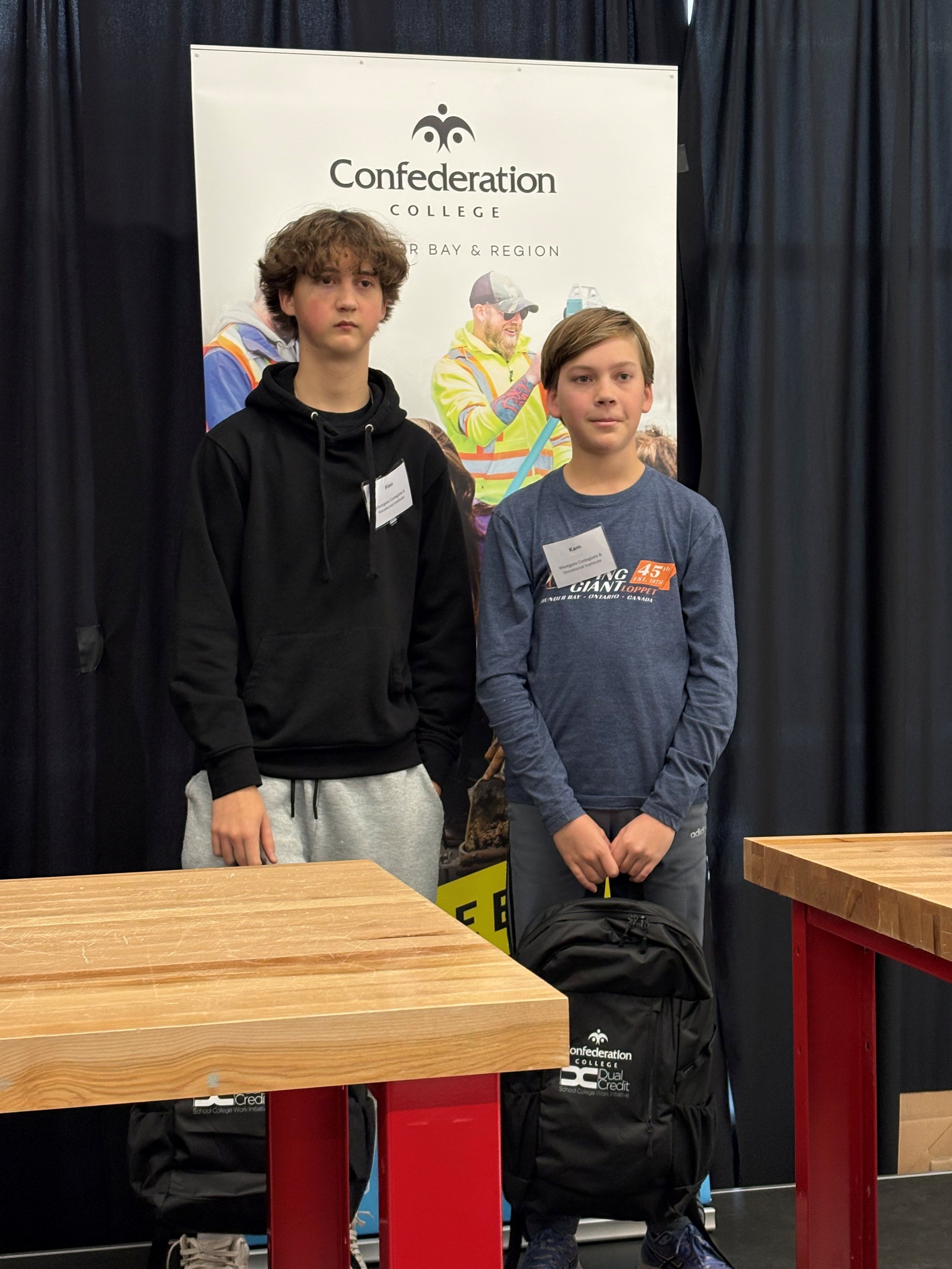 Students posing with backpacks after participating in a Confederation College Dual Credit engineering event