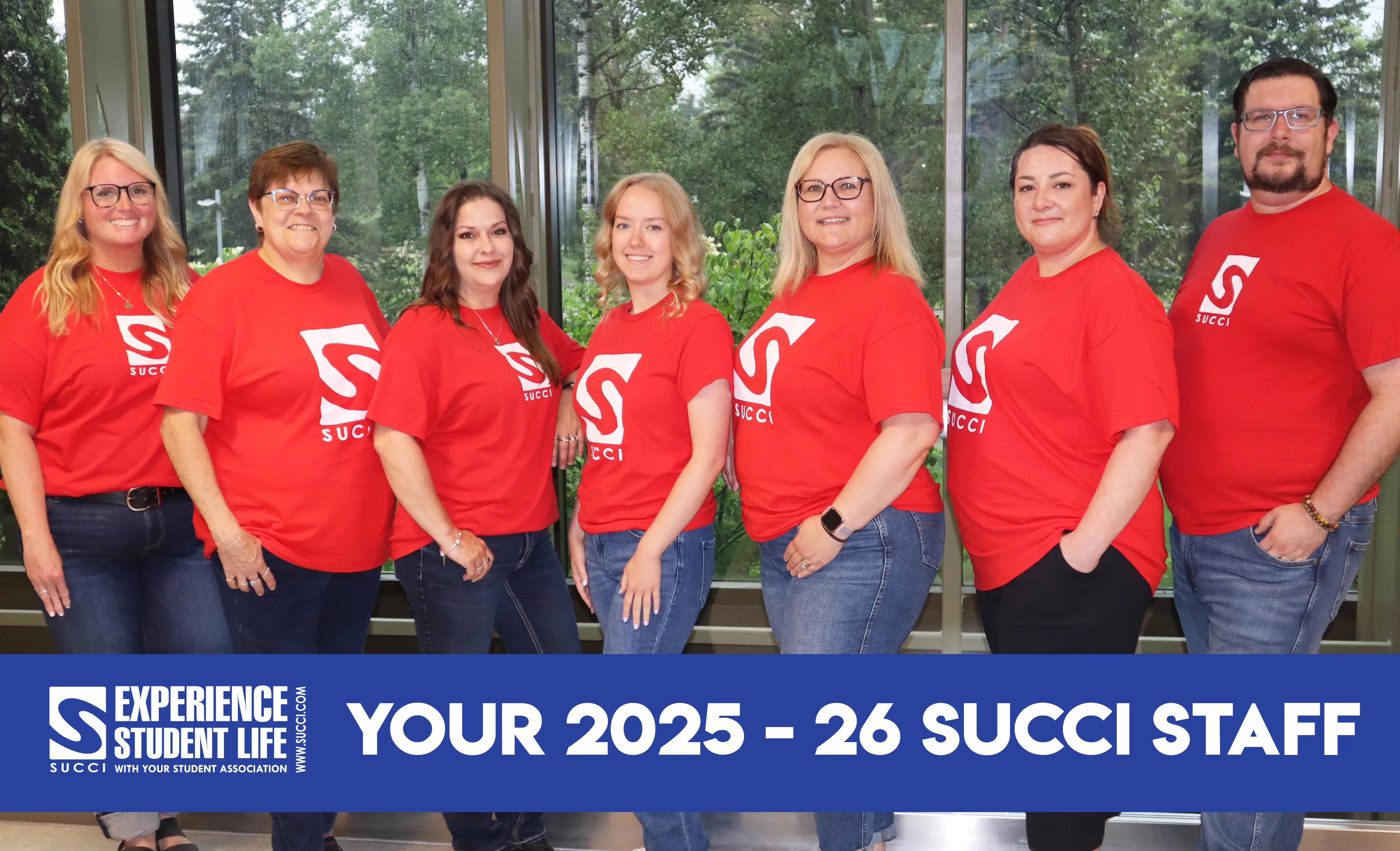 SUCCI staff members for the 2025–26 academic year wearing SUCCI shirts indoors