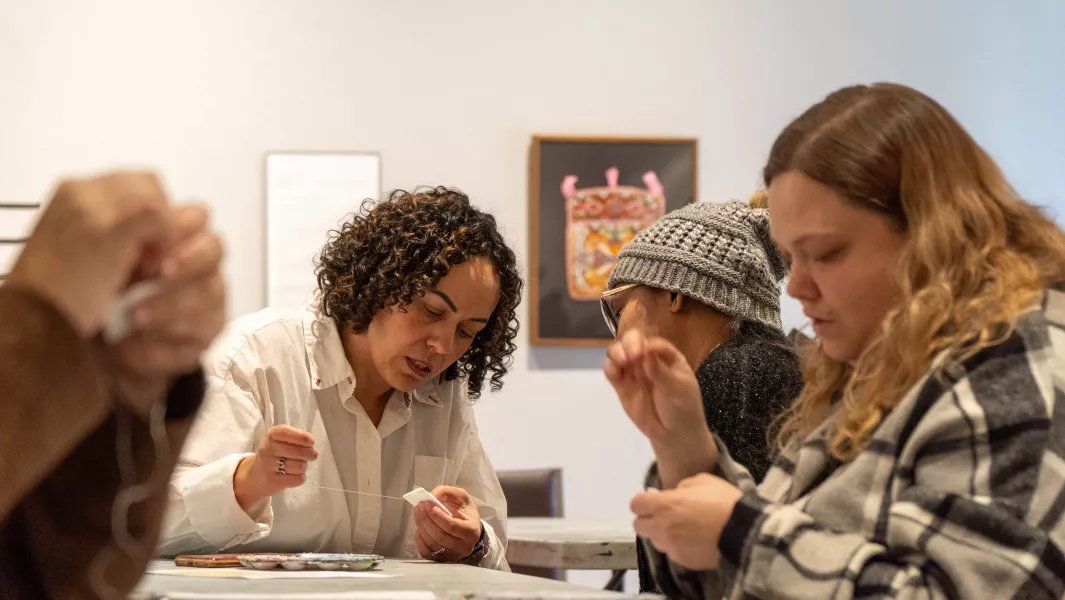 Participants focused on a hands-on crafting activity at a workshop