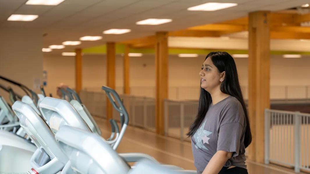 Student walking on a treadmill at the Confederation College Wellness Centre