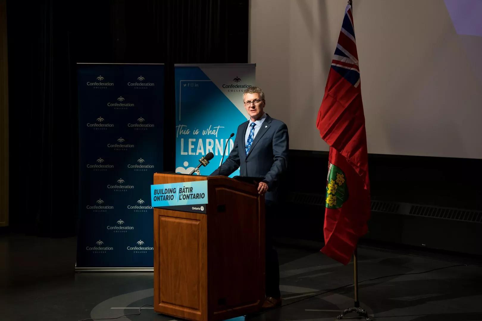 MPP Kevin Holland speaks at Confederation College during the Dibaajimogamig lecture theatre revitalization announcement