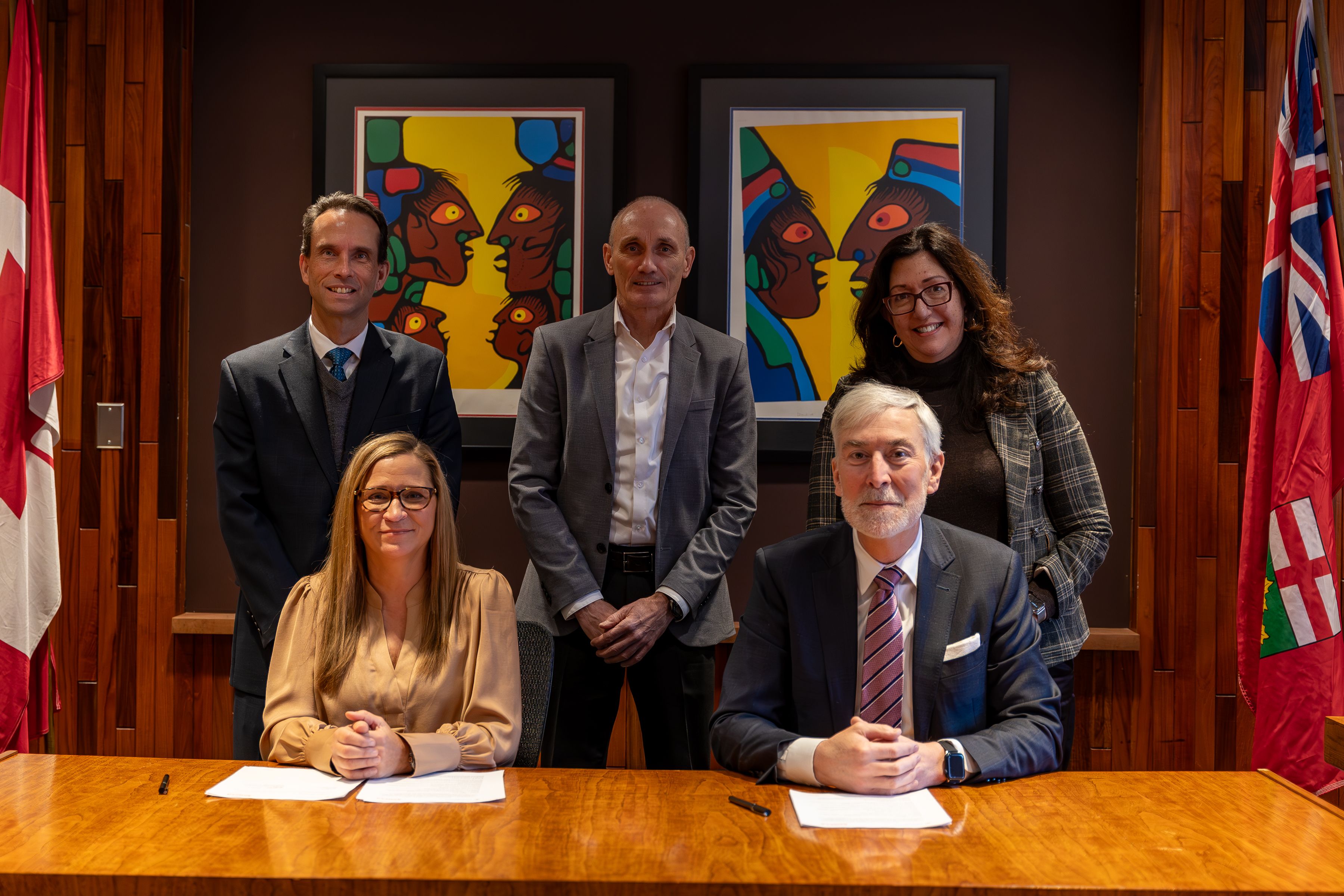 Confederation College and Seneca Polytechnic leaders gathered for the partnership announcement