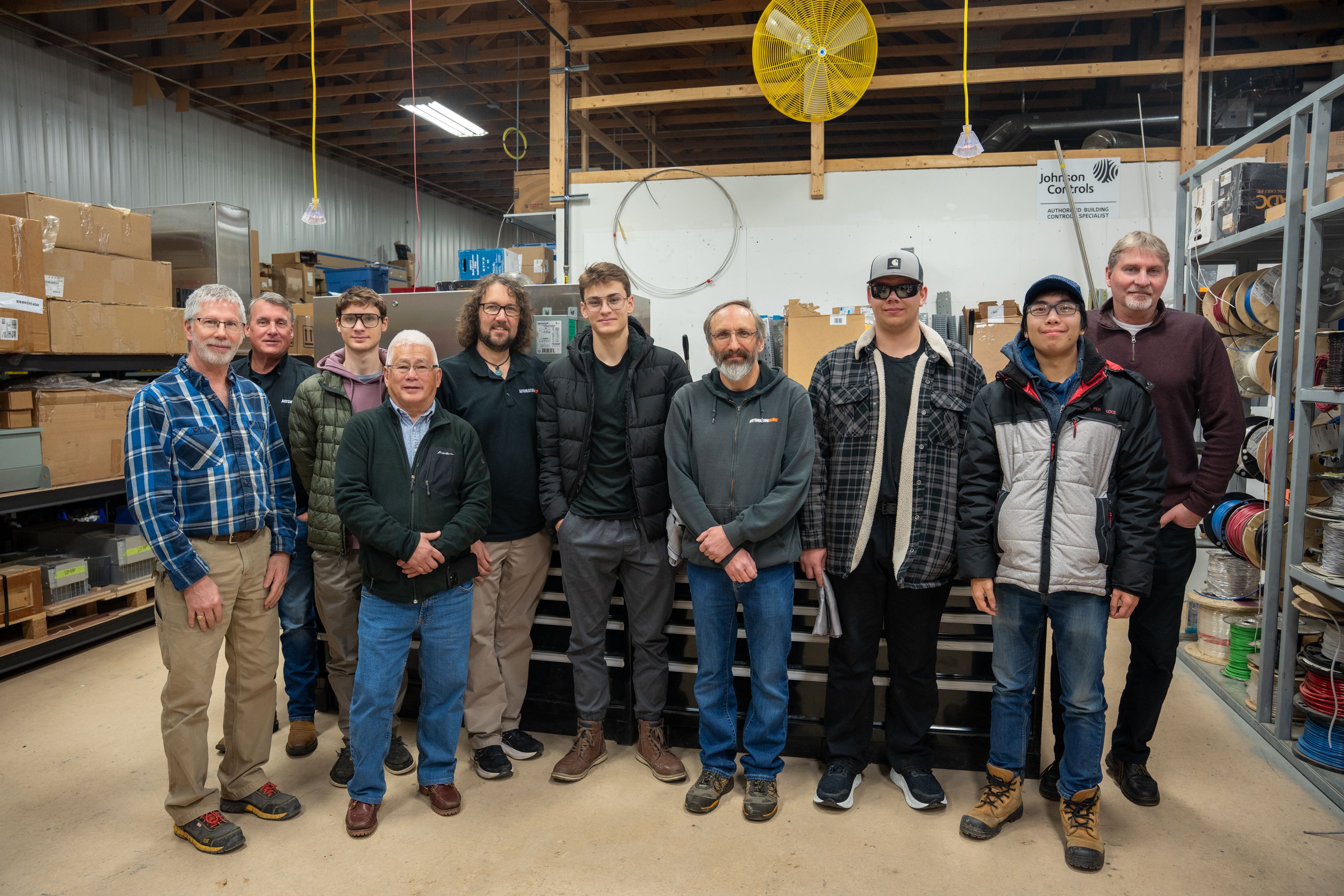 Confederation College students and Automation Now staff pose together during a skilled trades mentorship visit