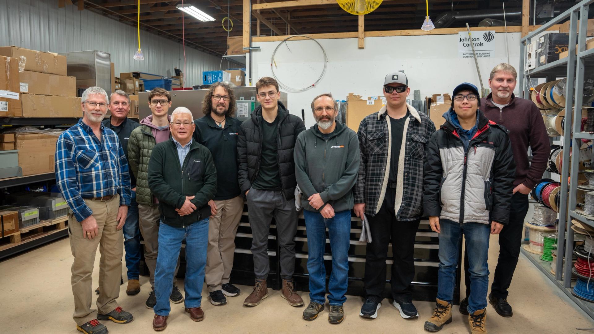 Confederation College students and Automation Now staff pose together during a skilled trades mentorship visit