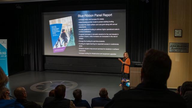 Michelle Salo delivering speech at Report to Community