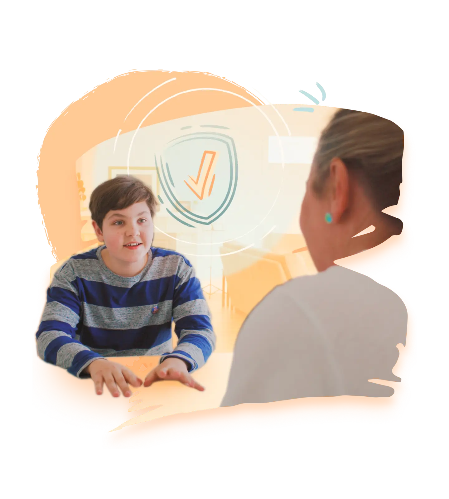 A young boy and an adult engaged in learning activities together at home, promoting resilience skills and emotional development