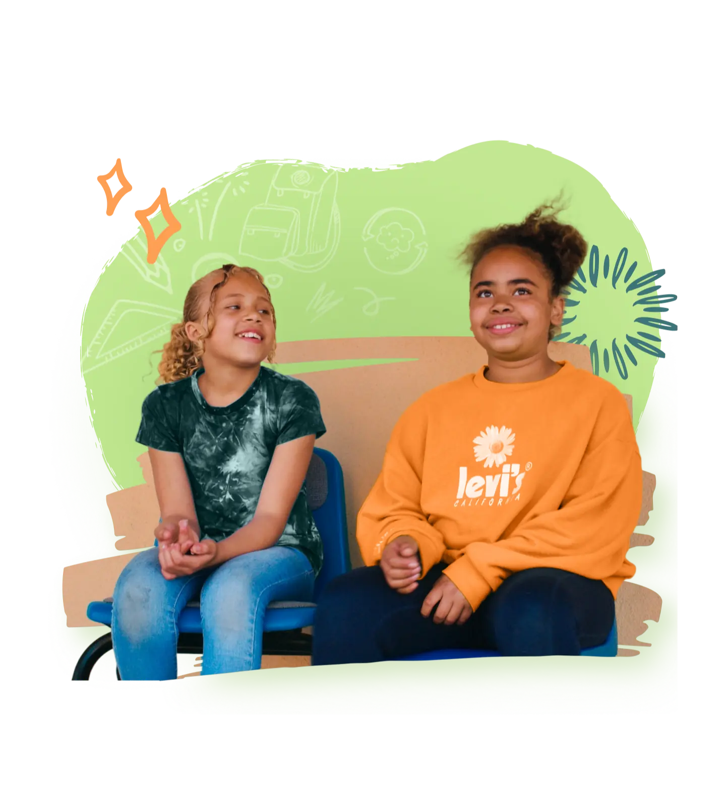 Two young girls seated on a bench, smiling and engaged in learning activities