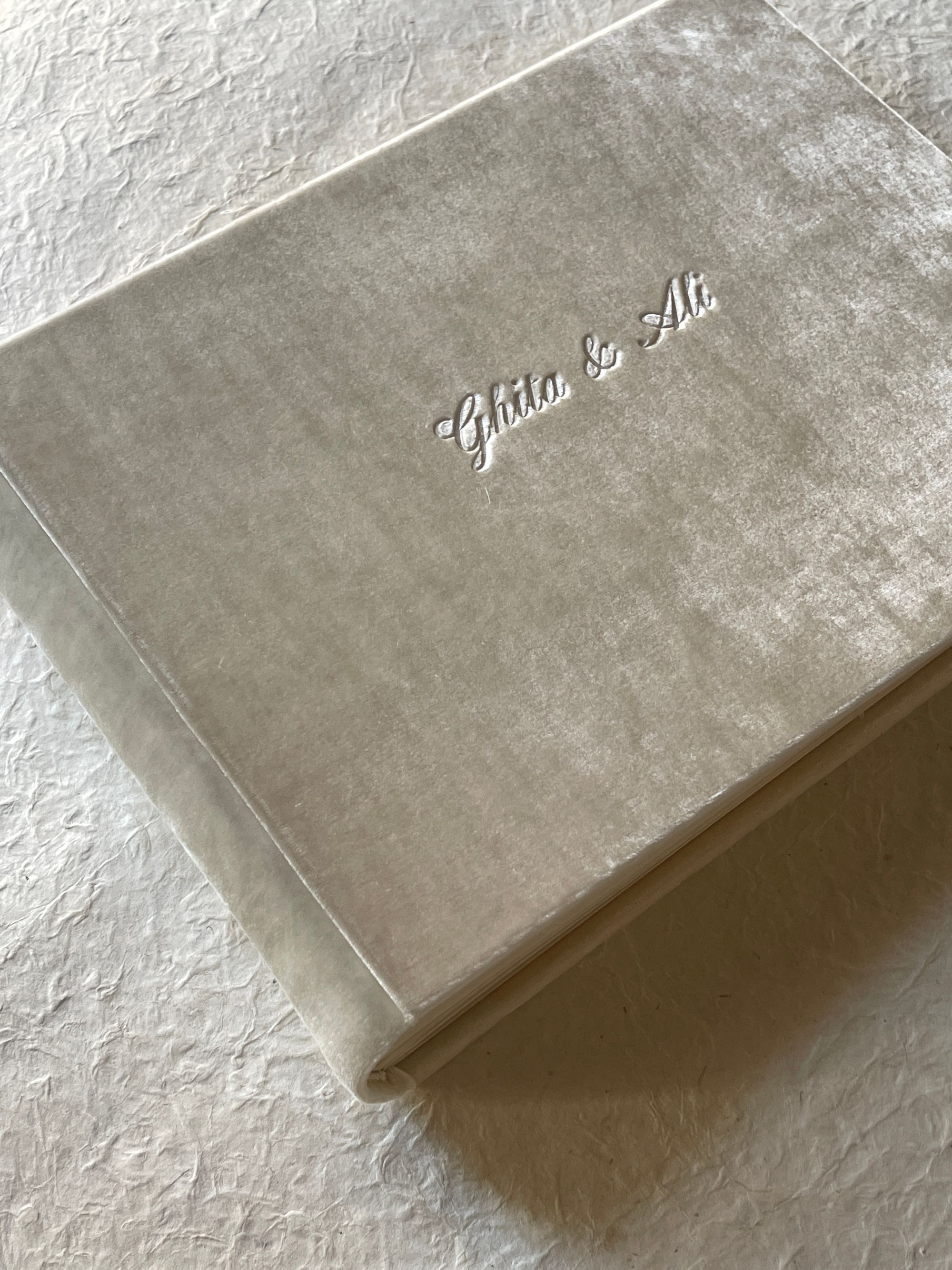 Velvet wedding album with the couple's names in silver