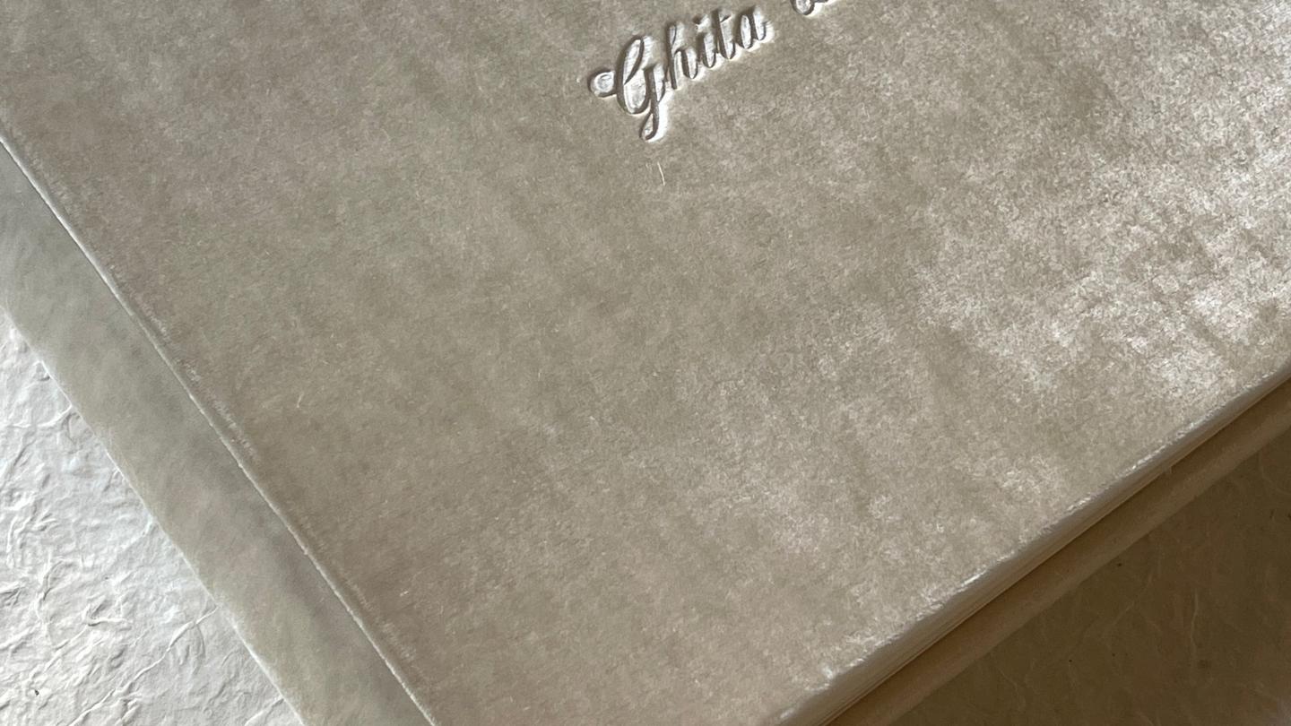 Velvet wedding album with the couple's names in silver