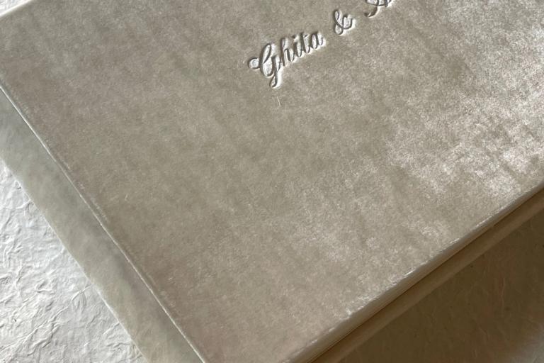 Velvet wedding album with the couple's names in silver
