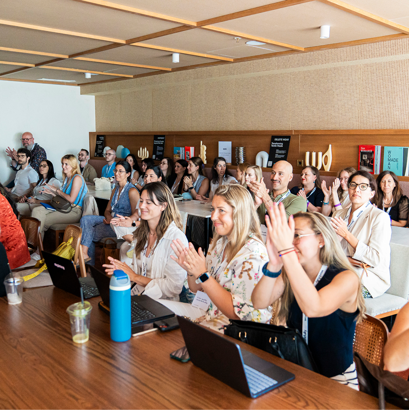 Attendees clapping during a Workfully workshop session