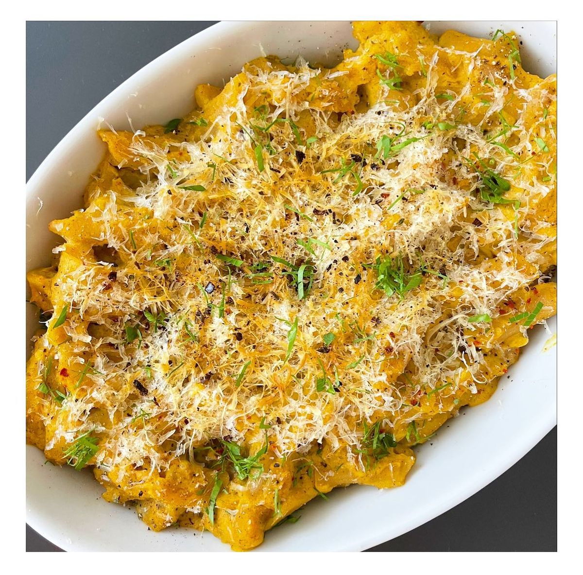 Close up picture of grain free pumpkin Mac and cheese in a serving dish
