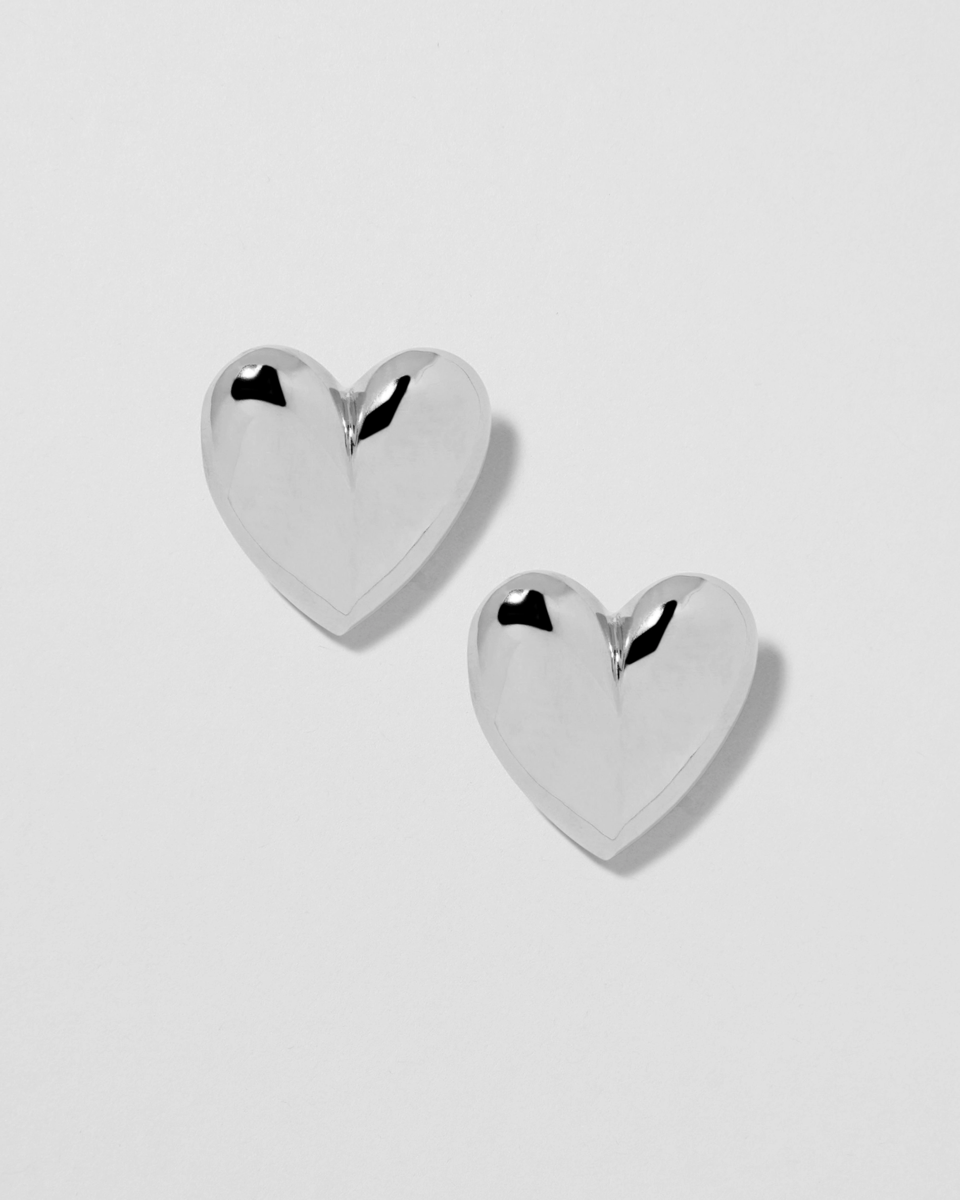 silver puffy chunky heart earring