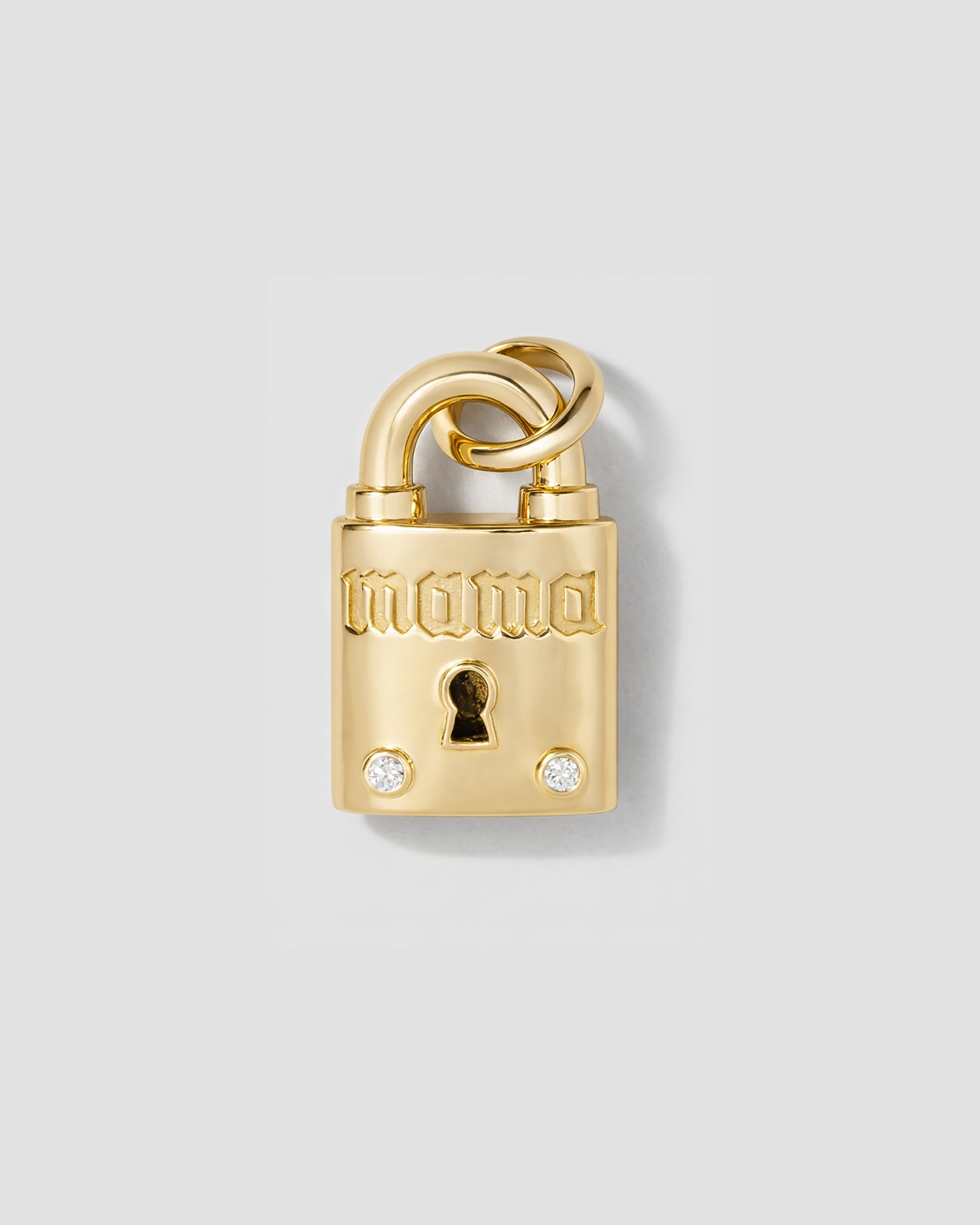 Lock with 2 diamonds that says MAMA in gothic font
