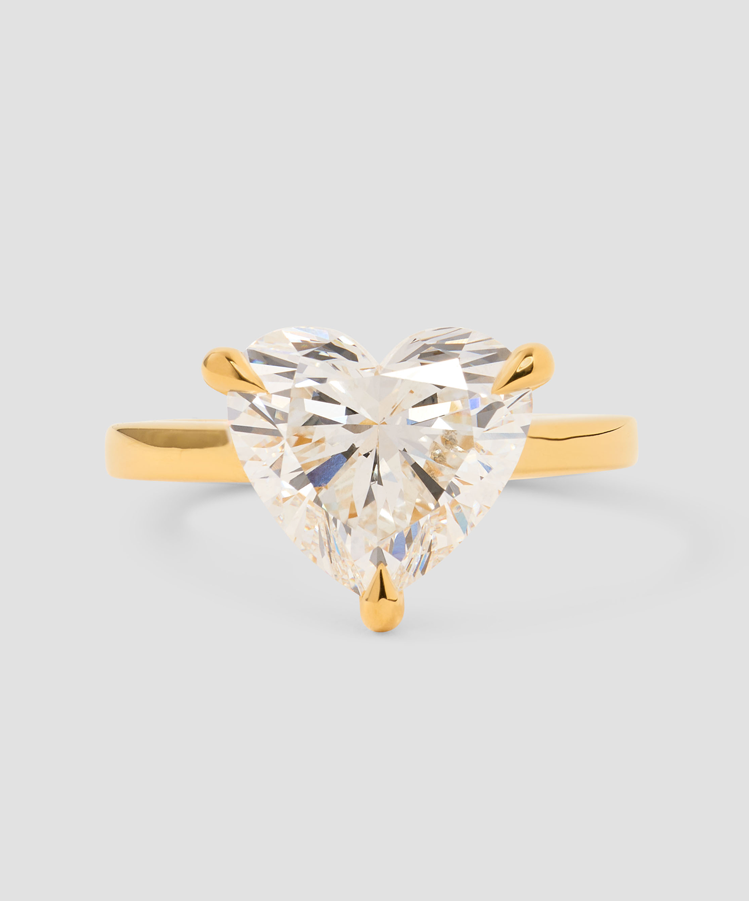 Diamond heart ring on. grey background