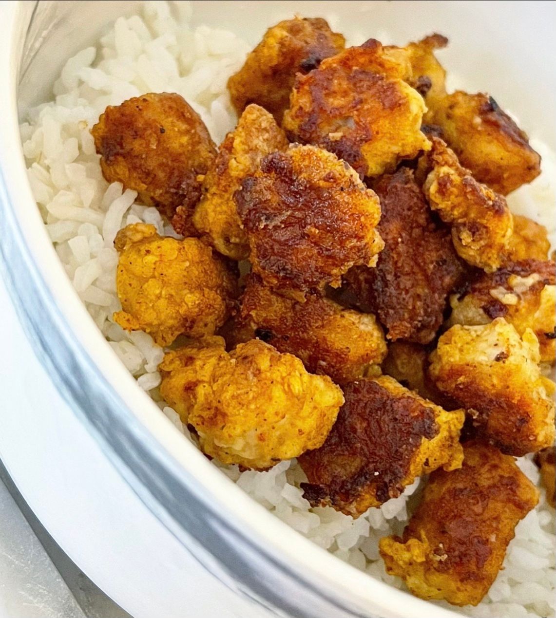 Photo of popcorn pork with rice
