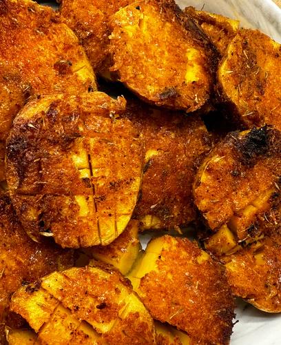 Roasted creamer potatoes. Halved and scored.