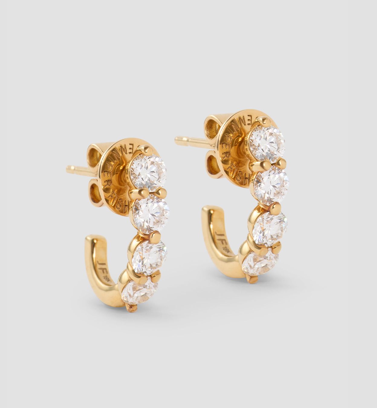2 diamond earrings with 4 diamonds. g18k gold